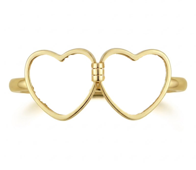 Your heart locket ring, open, with your photos inside